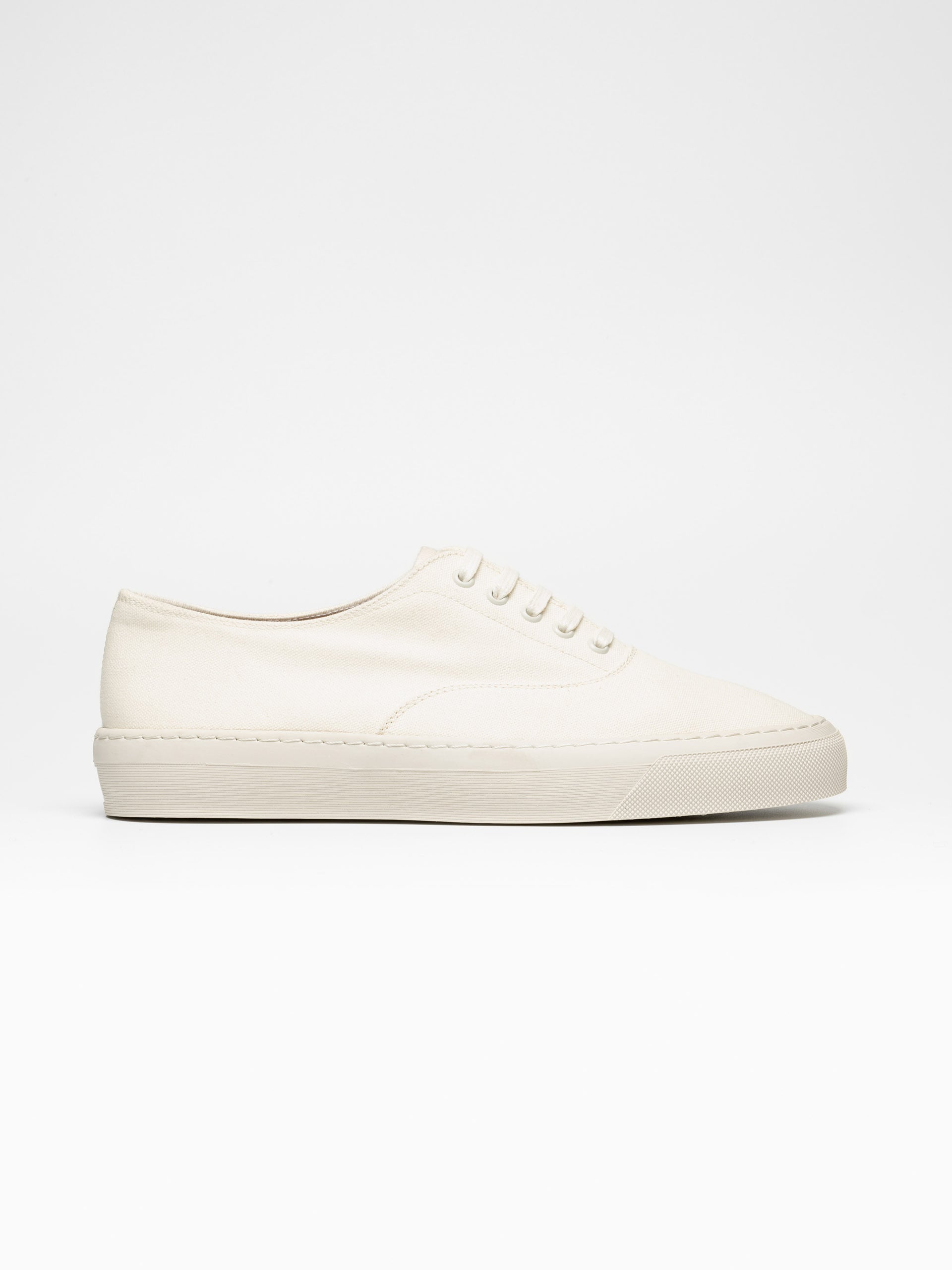 The Deck Shoe Cream Canvas 1