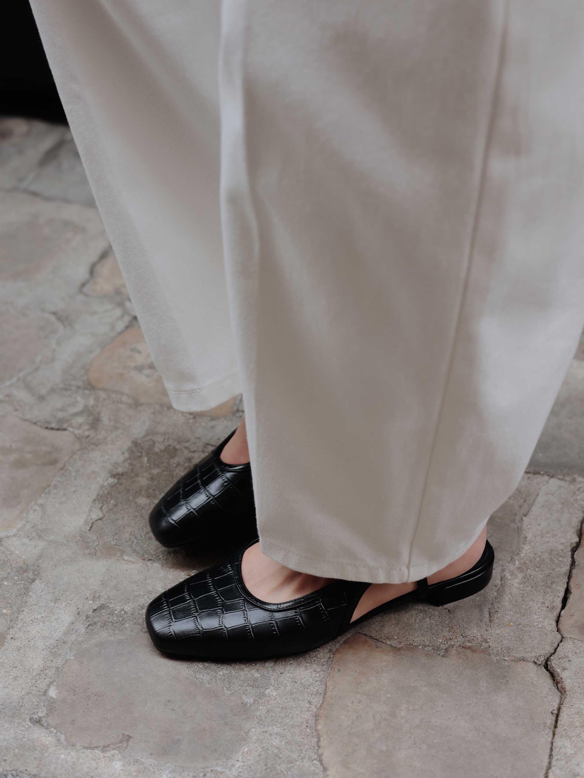 The Flat Slingback Black Embossed 2